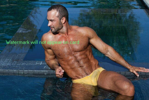 POSTCARD / Nate Karlton yellow swimsuit in pool