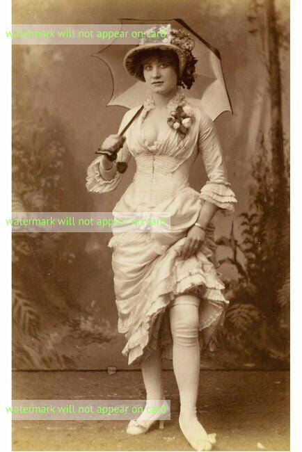 POSTCARD / 19th century woman showing her knee