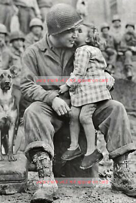 POSTCARD / Soldier holding little girl
