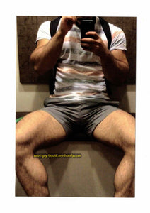 POSTCARD / Muscular legs on the subway