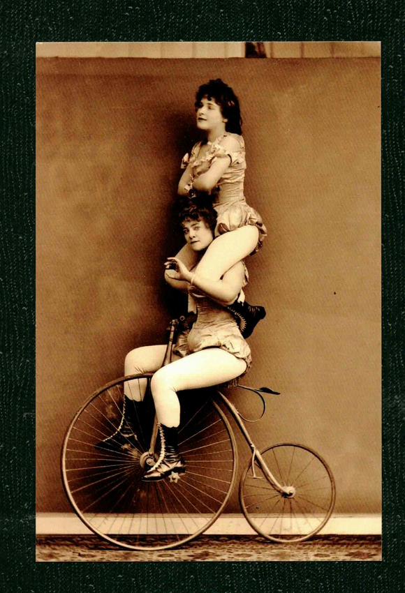 POSTCARD / Two Victorian women circus cyclists, 1891