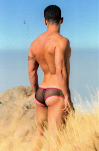 POSTCARD / Man in tight underwear in dunes