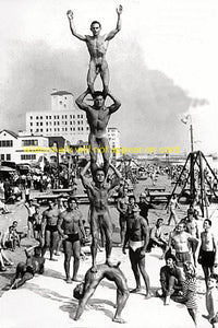 POSTCARD / Acrobatic nude men on the beach