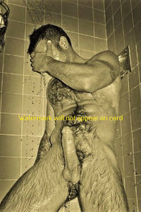 POSTCARD / Man hiding face under shower