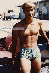 POSTCARD / Rod Bauer in swimsuit against car