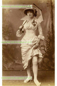 POSTCARD / 19th century woman showing her knee