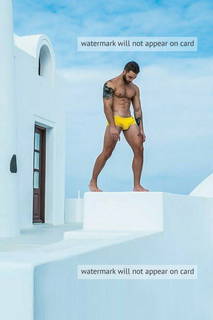 POSTCARD / Man in yellow swimsuit against blue sky