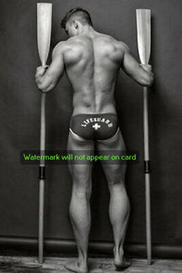 POSTCARD / Lifeguard holding oars